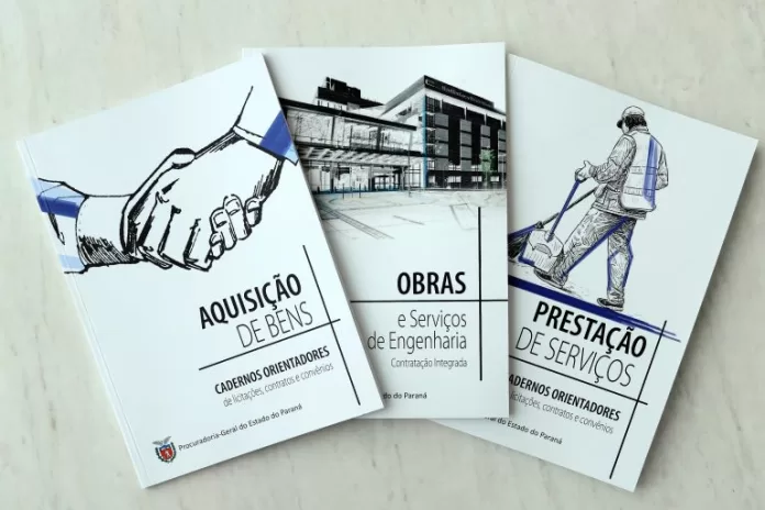 Três livros em cima da mesa